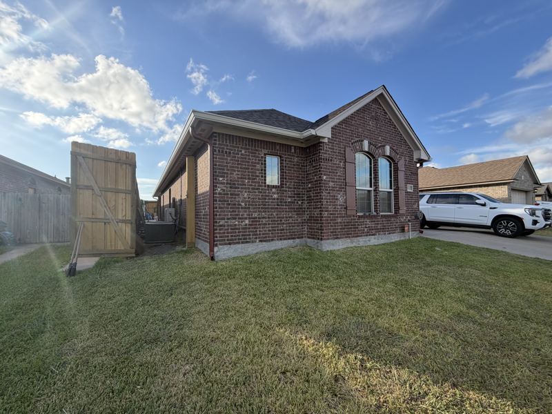 Red brick home with pool — Portland, TX