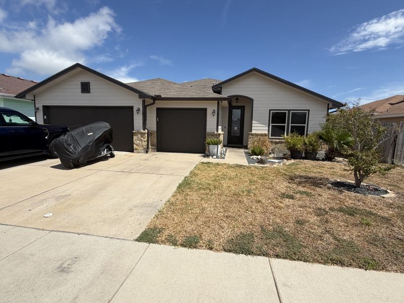 White siding and stone home — Corpus Christi, TX