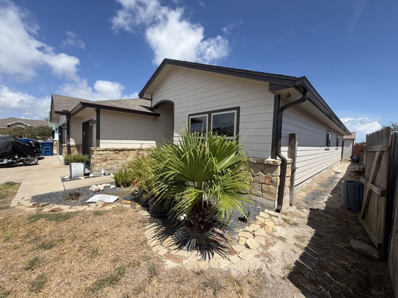 White siding and stone home — Corpus Christi, TX