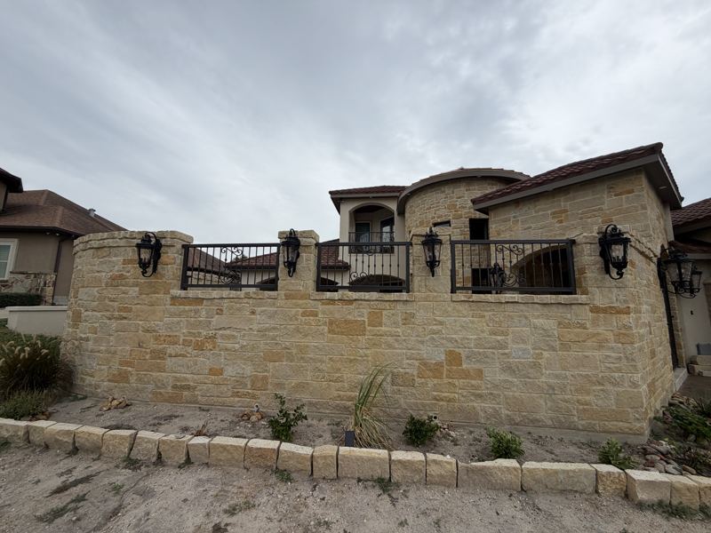 Tan stucco and stone home — Corpus Christi, TX