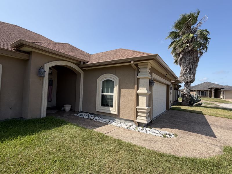 Tan stucco home — Corpus Christi, TX