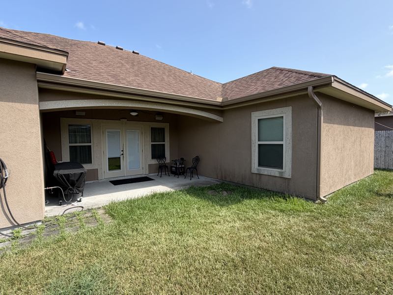 Tan stucco home — Corpus Christi, TX