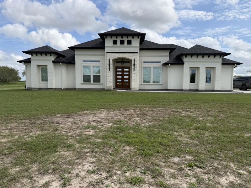 White stucco country home — Corpus Christi Area, Oct 2026